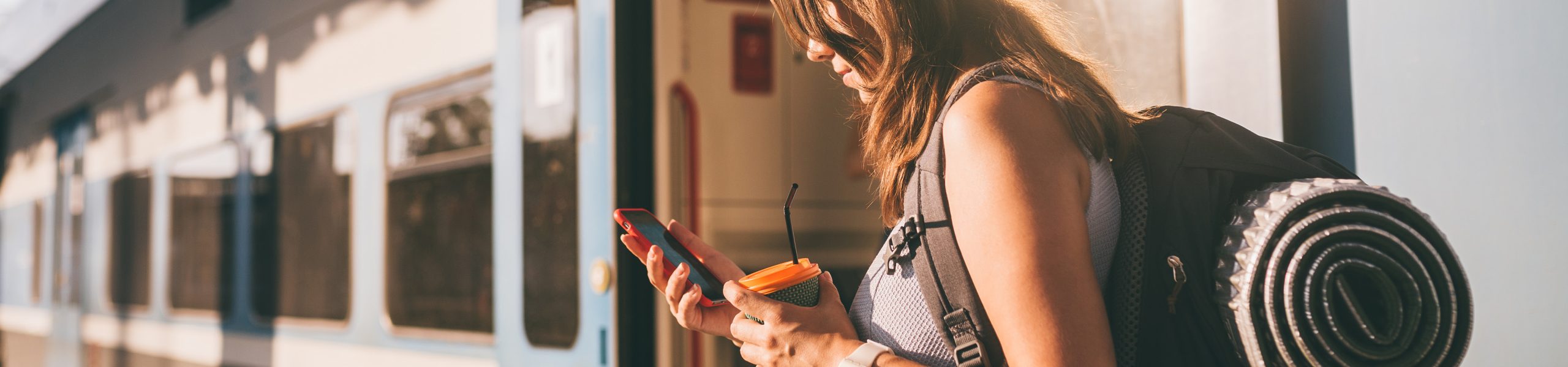 Traveller checking mobile phone
